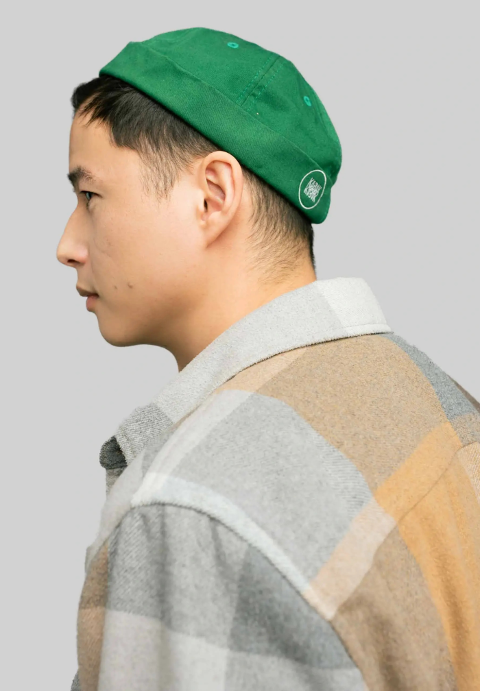 Docker cap grassy green
