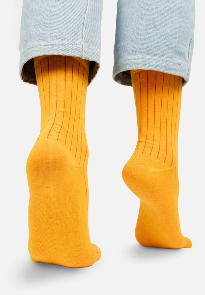 Lemon yellow organic cotton suit socks with red elastane