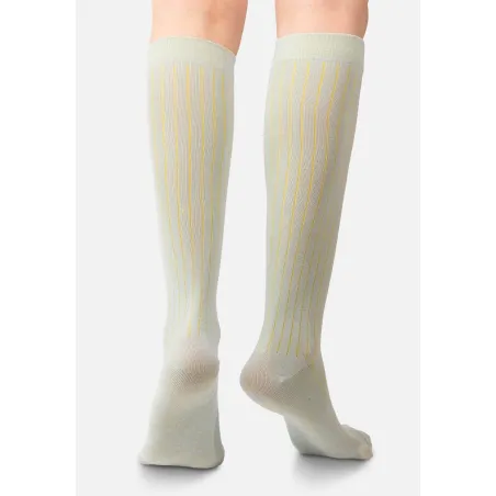 Light blue knee-high organic cotton socks with yellow stripes