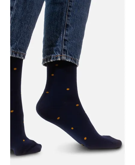 Navy blue socks with mustard dots