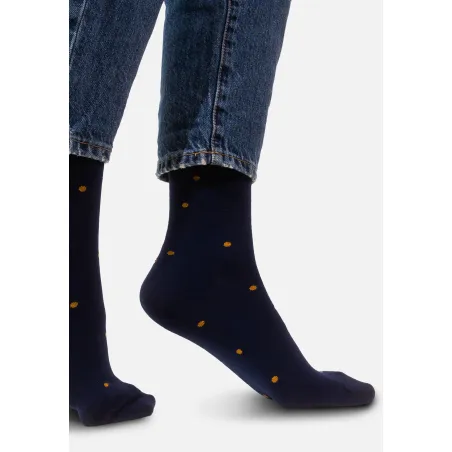 Navy blue socks with mustard dots