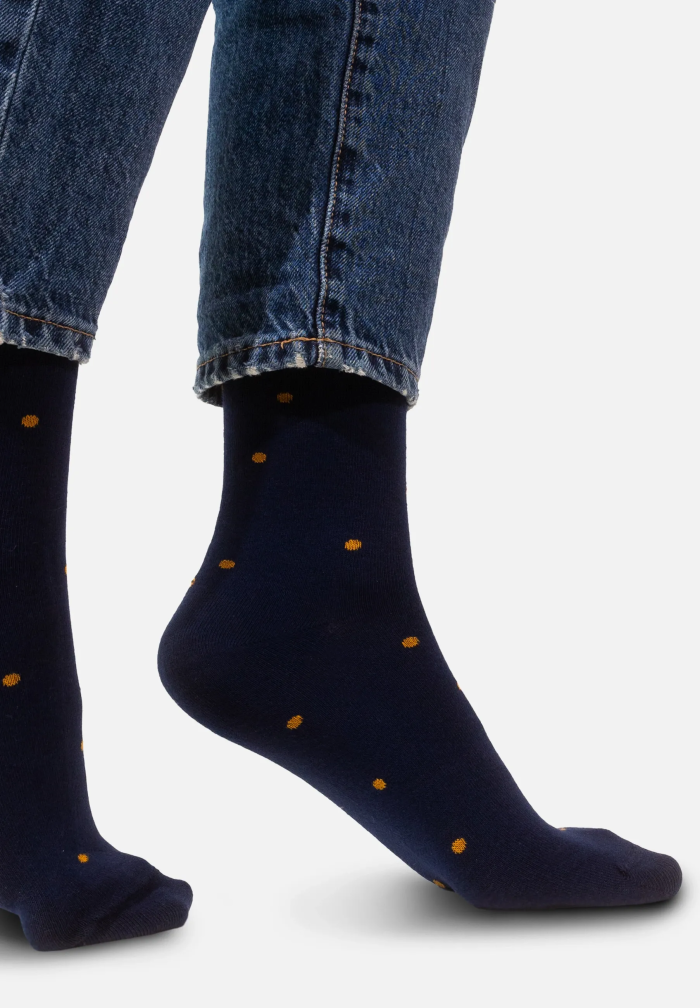Navy blue socks with mustard dots