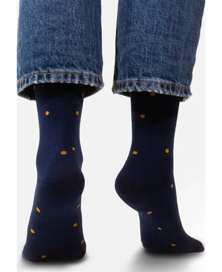 Navy blue socks with mustard dots