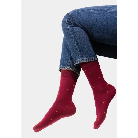 Burgundy socks with mustard dots